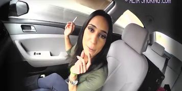 Tia Smoking in Car