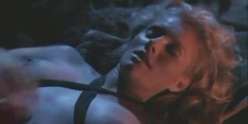 Lana Clarkson Breasts Scene  in Deathstalker