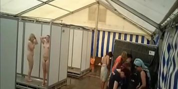 Lots of naked girls in a big public shower