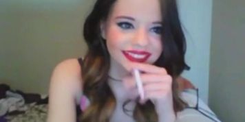 Gorgeous young girl smoking sexy