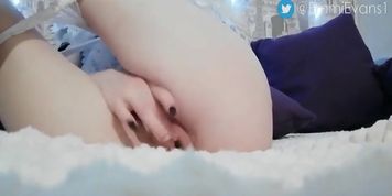 Schoolgirl caresses her pussy with her fingers