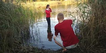 Wetlooker woman in lake