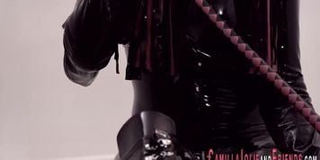 Latex clad bdsm tranny