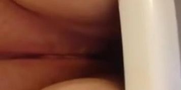 Girl peeing in toilet close up
