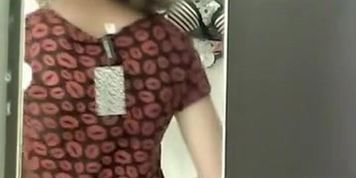 Girl shows herself in the black and white striped bra