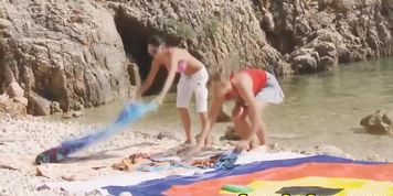 Gaming beach babes riding and sucking
