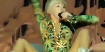 Miley Cyrus sings in a skimpy thong leotard