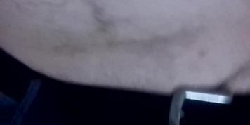 Chubby boy shows his belly
