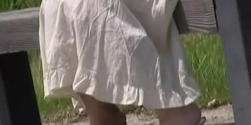 Teeny oriental hottie loses her long skirt when some dude rips it