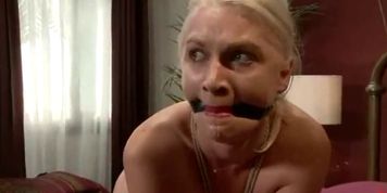 Bondage blonde babe gets spanking and sexual domination