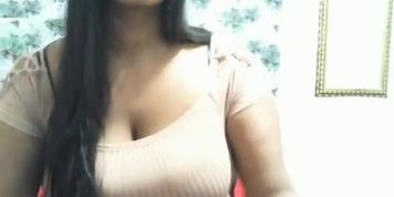 Who is she? Big tits brown girl.