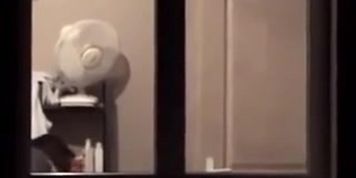 The window of my neighbor is opened showing her nude tits