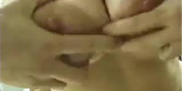 Big titted Milf sucks a big cock