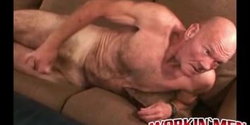 WORKIN MEN VIDEOS - Old man lays back and pulls on his cock until it gets hard
