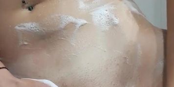 Shaving my pussy in shower and having fun with my big tits