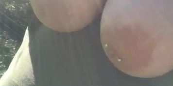 Busty BBW quick flash in the garden while neighbor is outside 