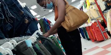 BRALESS EBONY GIRL with small saggy tits rough nipples 