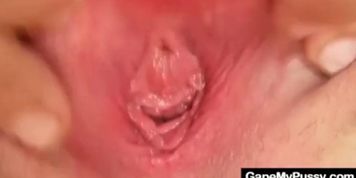 Blonde Lilith Lee pulling and spreading pussy lips