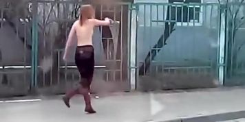 Topless on the street.