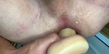 Male in lingerie playing with dildo, with creampie and cum