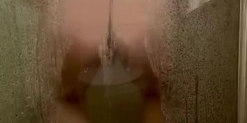 Hidden camera catches steamy shower orgasms, ass and boobs pressed against the glass...