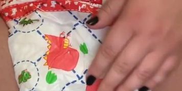 playing with my soaked and crinkly diaper
