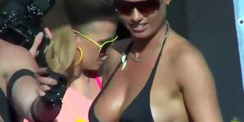 Party girl shakes her glittered tits