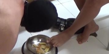 FEMDOM feeds her humiliated husband at her feet
