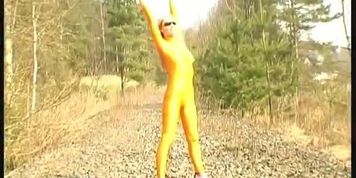 Blonde girl strips outdoor in spandex