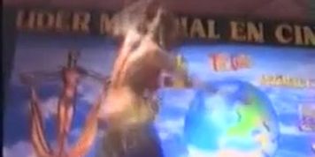 Belly dancer strips and plays with herself