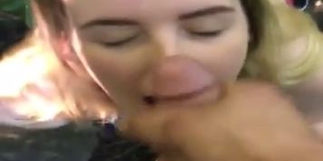 Sexy blonde gets facial cumshot in the woods