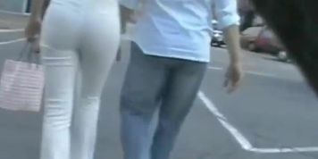 Street candid hot red head in tight pants and n ass out of this world