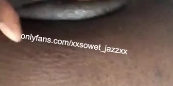 Ebony girl plays with her tight wet pussy
