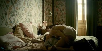 Esther Comar topless and erotic movie scenes