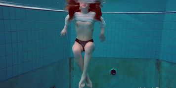 Underwater swimming girl Alice Bulbul