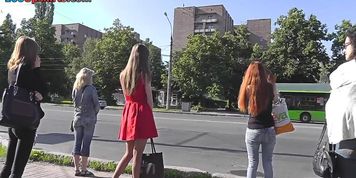 Auburn gal with petite ass in g-string in upskirt vid