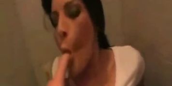 Hot brunette gets fucked and facialized in a public restroom