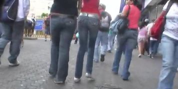 Cute Latina flaunts her butt in tight jeans before a