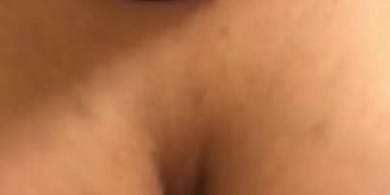 Cumshot on huge ebony boobs