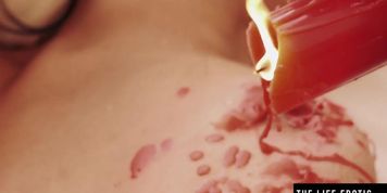 These gorgeous lesbians enjoy hot wax play while licking pussy (Ellen Saint, Nicolette)