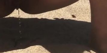 Pissing at the beach 