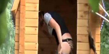 Charming girl caught during park peepee