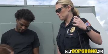 Milf cops take thug up to a rooftop after spying on naked women