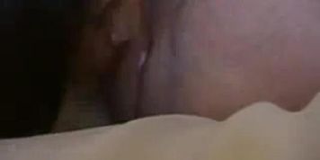 Sexy brunette is an expert in licking balls