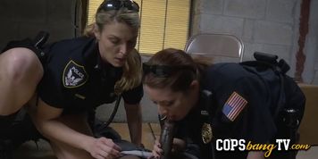 Busty female cops are banging a black criminal before they arrest him