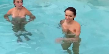 Two girls get naked get wet