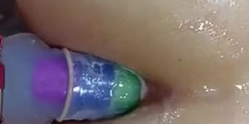 Girl With Amazing Round Ass Is Using A Rainbow Toy To Get Intense Pleasure. She'S Fucking Her Ass And Shows A Nice Cap Right Aft