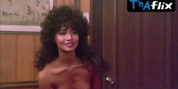Peggy Tam Breasts,  Bush Scene  in The Protector
