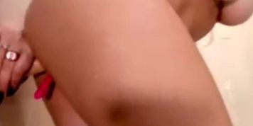 Hitting the dildo under shower