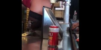 Bartender Maria Pours beer with booty (Melena Tara)
